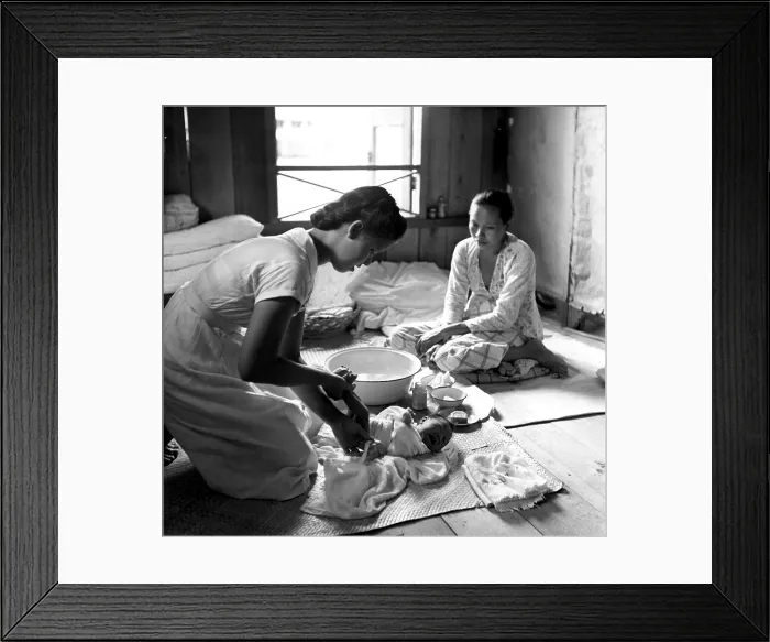 Framed Print : The Mother and child Health Program in Sarawak is run by the government with U.N. help. The supplies come from UNICEF and the experts from the World Health Organization
