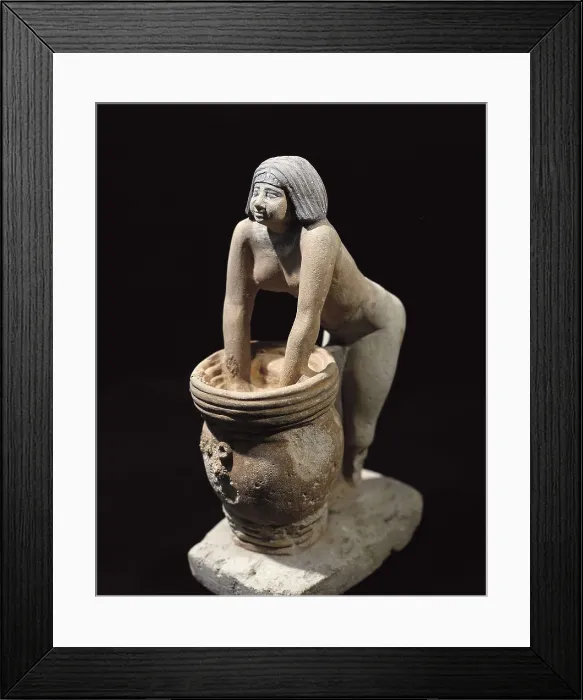 Framed Print : Woman making beer. ca. 2465 BC. Servant preparing beer. Egyptian art. Old Kingdom. Terra-cotta. EGYPT. Cairo. Egyptian Museum. Proc: EGYPT. Saqqara