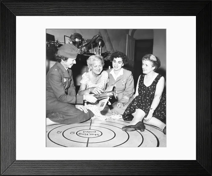 Framed Print : Jacqueline Cochran (2nd from left) and famous women flyers talk shop at her NYC apartment