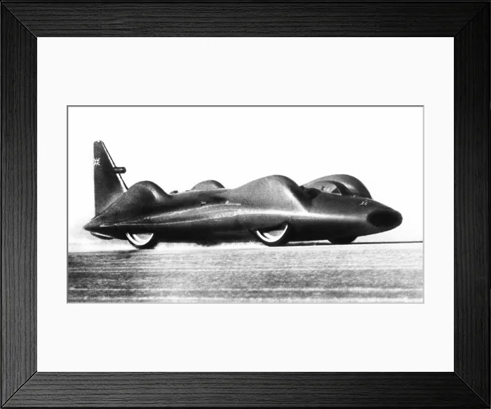 Framed Print : Don Campbell churns ups the salt flats of Lake Eyre, Australia with the Bluebird CN7 in a test run. May 9, 1964