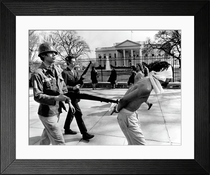 Framed Print : Anti-Vietnam War Protestors calling themselves Spring Mobilization for Peace, demonstrating with toy rifles in front of the White House, Washington D.C. 04-08-67