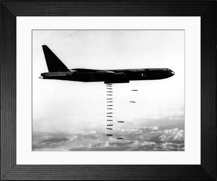 Framed Print : A B-52 Stratofortress releases bombs on Vietnamese troop concentrations in South Vietnam, March 31, 1967. Courtesy: CSU Archives / Everett Collection