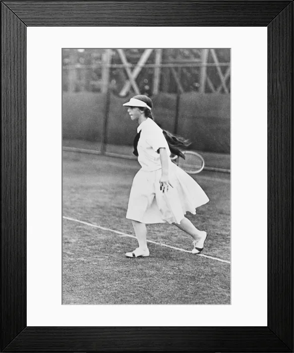 Framed Print : Helen Wills, woman champion tennis player ca. 1921. She is playing in the new knee-length pleated skirts. (CSU_2015_11_1564)