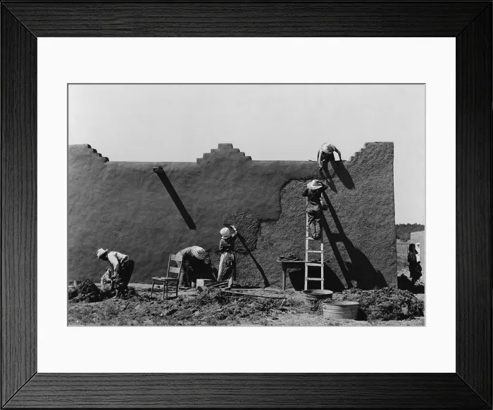 Framed Print : Women replastering an adobe house, photograph by Lee Russell, Chamisal, New Mexico, July, 1940
