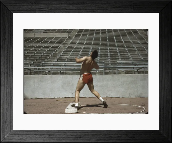Framed Print : Nebraska, shot putter at the University of Nebraska, photograph by John Vachon, 1942