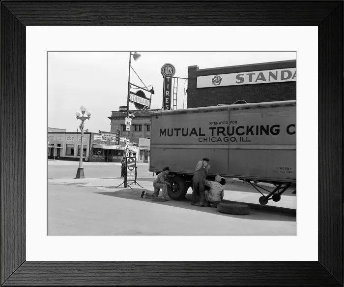 Framed Print : Nebraska, changing a tire on a trailer truck, Kearney, photograph by John Vachon, Omaha, May, 1942 Framed Print : Nebraska, changing a tire on a trailer truck, Kearney, photograph by John Vachon, Omaha, May, 1942
