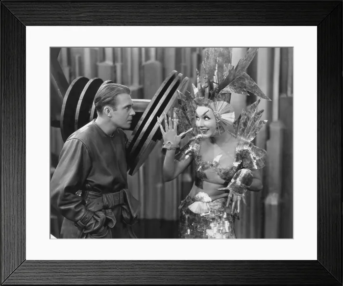 Framed Print : JUST IMAGINE, from left: John Garrick, Joyzelle Joyner, 1930, TM & Copyright 20th Century Fox Film Corp. / courtesy Everett Collection