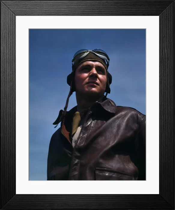 Framed Print : World War II, bomber pilot, Captain in a bombardment squadron, just before he climbs aboard his YN-17 bombing plane Framed Print : World War II, bomber pilot, Captain in a bombardment squadron, just before he climbs aboard his YN-17 bombing plane