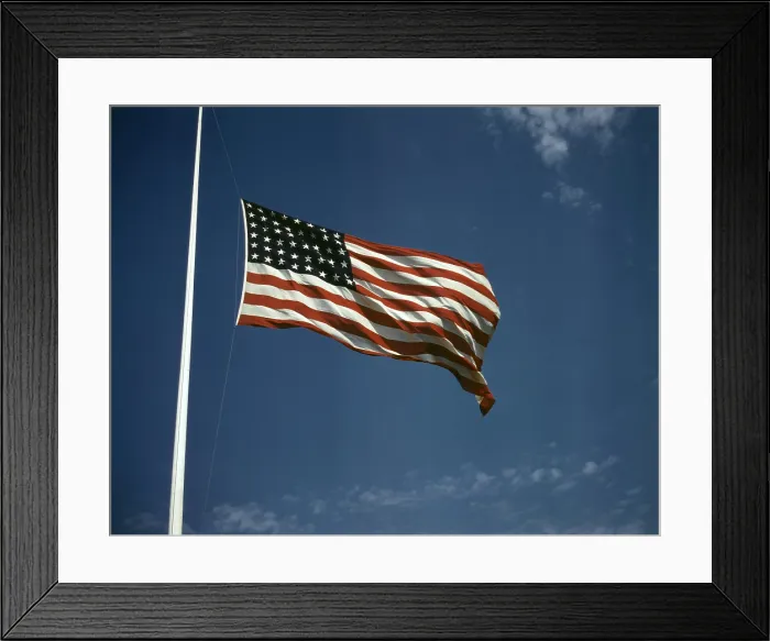 Framed Print : World War II, American flag, original caption: High above Framed Print : World War II, American flag, original caption: High above