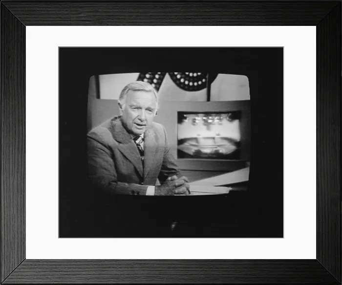 Framed Print : Walter Cronkite, American Journalist, on television during the 1st presidential debate between Gerald Ford and Jimmy Carter, in Philadelphia, Pennsylvania, photograph by Thomas J