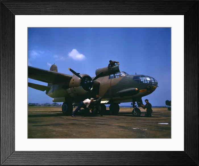 Framed Print : World War II, servicing an A-20 bomber, photograph by Alfred T. Palmer, Langley Field, Viginia, July, 1942