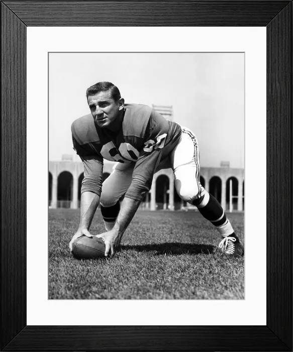 Framed Print : Chuck Bednarik, center and linebacker for the Philadelphia Eagles, 1959. Courtesy: CSU Archives / Everett Collection