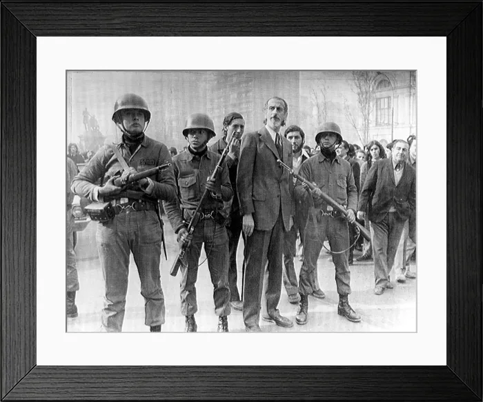 Framed Print : 6 / 29 / 73--SANTIAGO: Loyalist troops flank Defense Minister Jose Toha during a thwarted military uprising outside Chile's presidential palace Framed Print : 6 / 29 / 73--SANTIAGO: Loyalist troops flank Defense Minister Jose Toha during a thwarted military uprising outside Chile's presidential palace