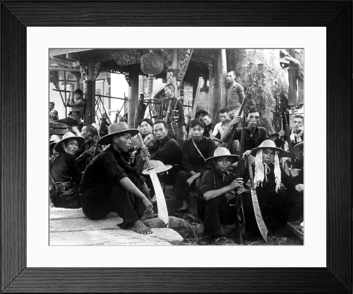 Framed Print : Chinese guerillas, who are fighting against the Japanese, armed with big swords as well as rifles, rest near Canton Framed Print : Chinese guerillas, who are fighting against the Japanese, armed with big swords as well as rifles, rest near Canton