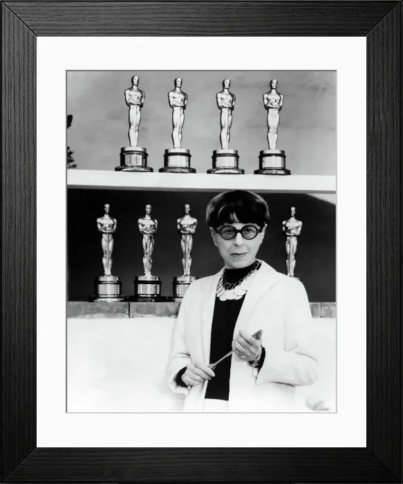 Framed Print : EDITH HEAD, surrounded by the eight Oscars she has won during a distinguished career. 1976. Courtesy: CSU Archives / Everett Collection Framed Print : EDITH HEAD, surrounded by the eight Oscars she has won during a distinguished career. 1976. Courtesy: CSU Archives / Everett Collection