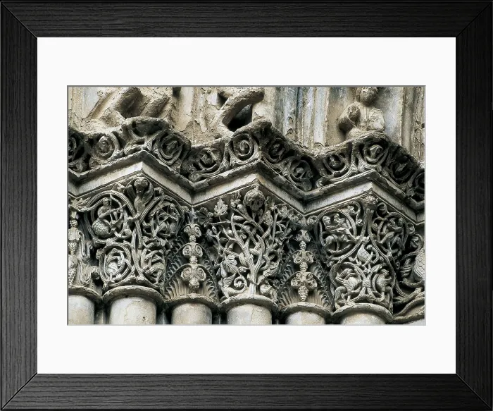 Framed Print : Church of Santa Mara in Agramunt. 13th c. SPAIN. Agramunt. Church of St. Mary. Capitals of the columns at the main gate. Romanesque art. Relief on marble