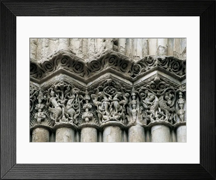 Framed Print : Church of Santa Mara in Agramunt. 13th c. SPAIN. Agramunt. Church of St. Mary. Capitals of the columns at the main gate. Romanesque art. Relief on marble