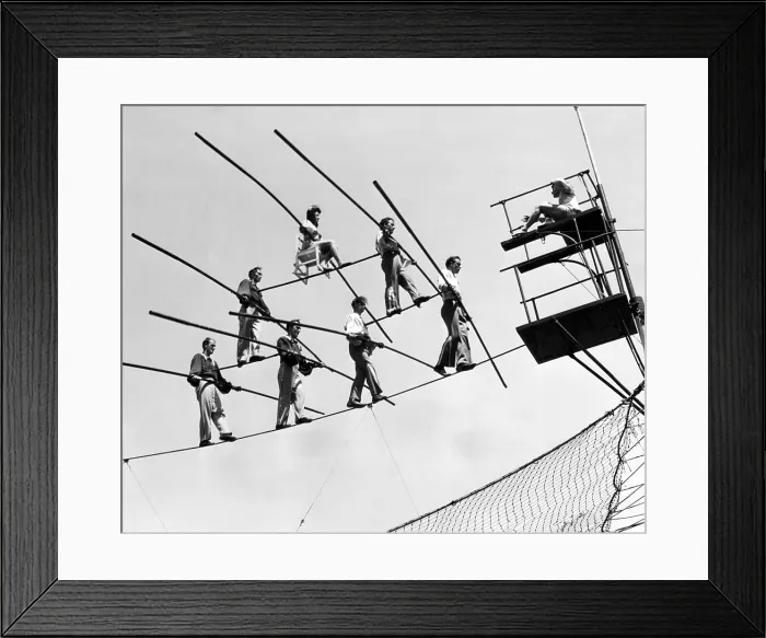 Framed Print : The Flying Wallendas, a circus act known for performing stunts without safety nets, practicing their act, 1947.. Courtesy: CSU Archives / Everett Collection Framed Print : The Flying Wallendas, a circus act known for performing stunts without safety nets, practicing their act, 1947.. Courtesy: CSU Archives / Everett Collection