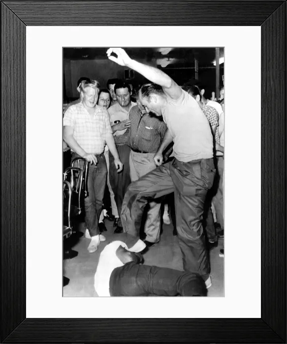 Framed Print : Jackson, Mississippi: 21-year-old Memphis Norman is beaten by a man identified as Benny Oliver, a former policeman, 5 / 28 / 63