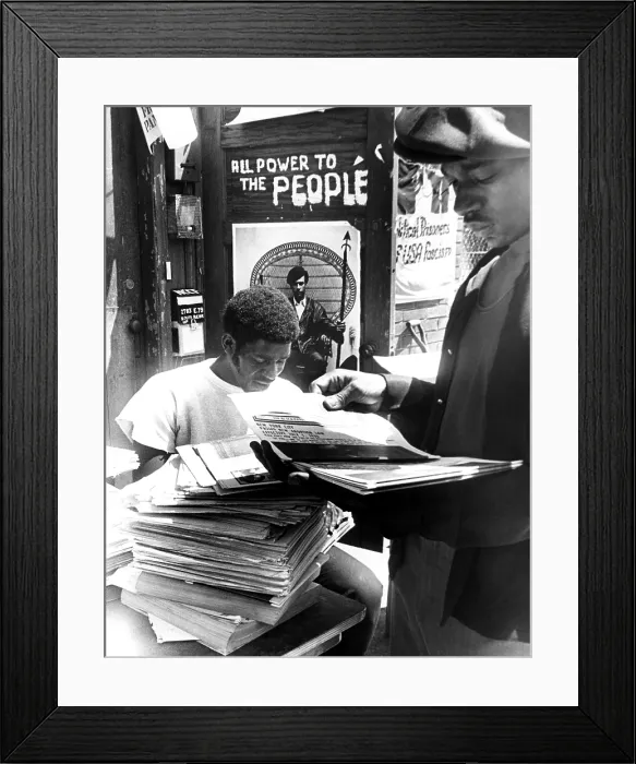 Framed Print : Two members of the Black Panther Party (Cleve Simpson, age 22, and David Hall, age 22) count issues of The Black Panther, July 1970.. Courtesy: CSU Archives  /  Everett Collection