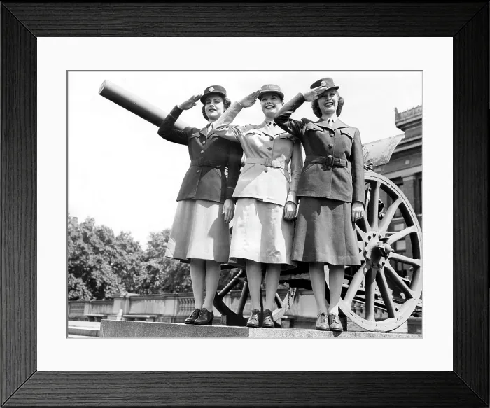 Framed Print : Gloria Pickett, Jane Greer (then Bette Jane Greer), and Inga Rundvold, modeling the uniforms to be worn by the Women's Auxiliary Corps, August 1942, Fort Des Moines, Iowa