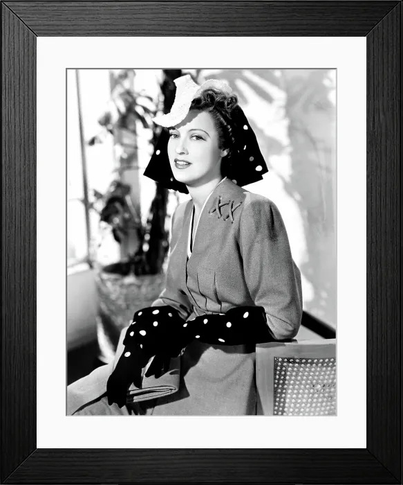Framed Print : CAIRO, Jeanette MacDonald, in a green wool suit with black and yellow dotted accessories by Robert Kalloch, 1942 Framed Print : CAIRO, Jeanette MacDonald, in a green wool suit with black and yellow dotted accessories by Robert Kalloch, 1942
