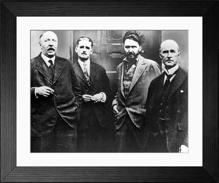 Framed Print : Ford Madox Ford, James Joyce, Ezra Pound and John Quinn at Pound's place in Paris in 1923