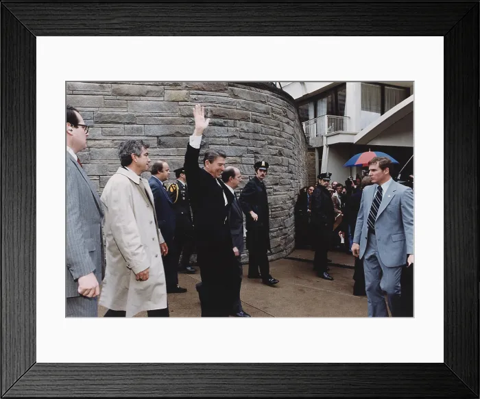 Framed Print : President Reagan waving to crowds immediately before being shot in an assassination attempt, Washington Hilton Hotel. March 30, 1981