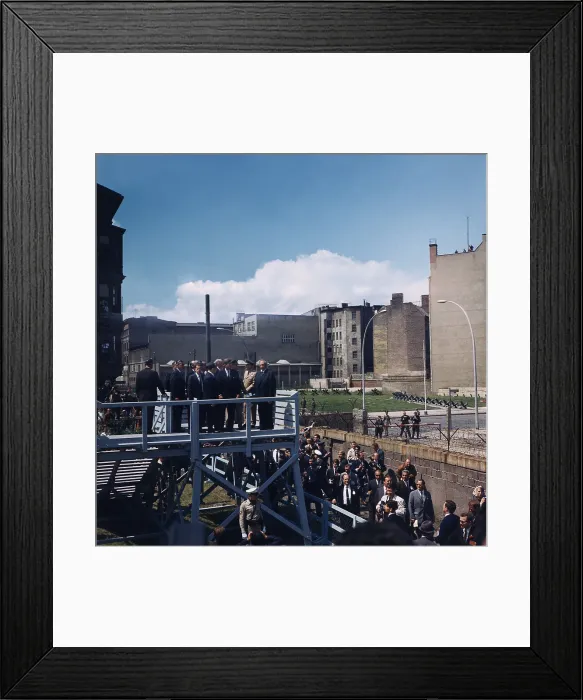Framed Print : President John Kennedy and West German Chancellor, Konrad Adenauer, looking over the Berlin Wall into East Berlin. June 26, 1963