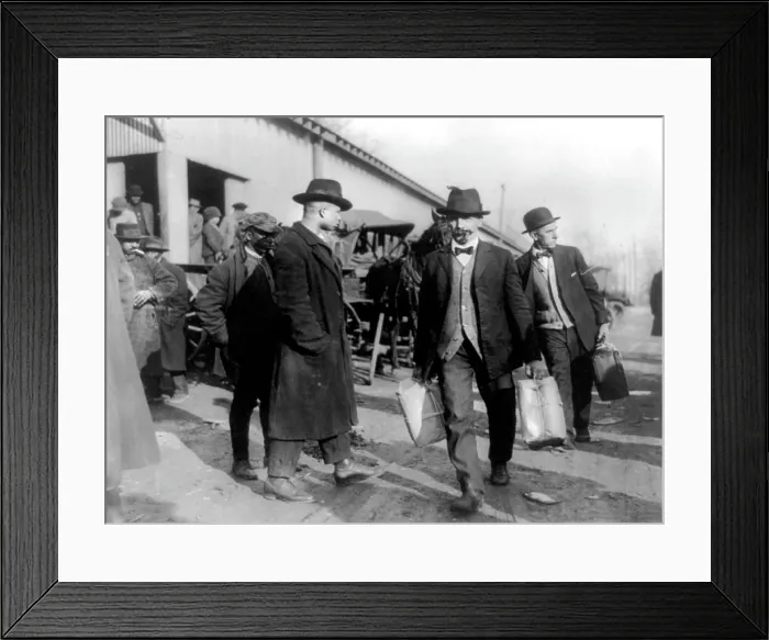 Framed Print : Prohibition, Two men, probably of the U.S. Internal Revenue Bureau carrying packages of confiscated liquor past two men, 1921-1932 Framed Print : Prohibition, Two men, probably of the U.S. Internal Revenue Bureau carrying packages of confiscated liquor past two men, 1921-1932
