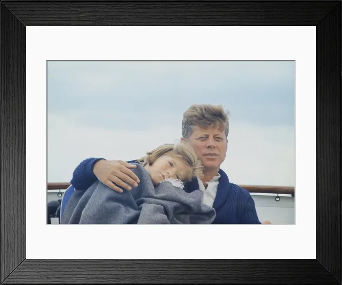 Framed Print : President John Kennedy with daughter Caroline Kennedy, aboard the family yacht, Honey Fitz in Hyannisport, Massachusetts. 1963
