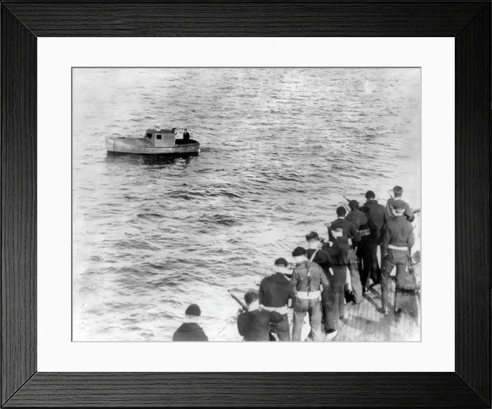 Framed Print : Prohibition, Coast Guardsmen with rifles along deck facing a small boat