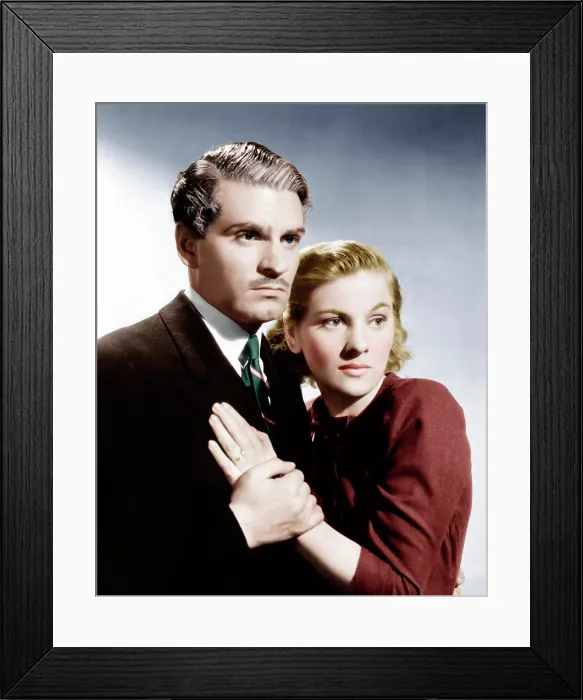 Framed Print : REBECCA, from left: Laurence Olivier, Joan Fontaine, 1940