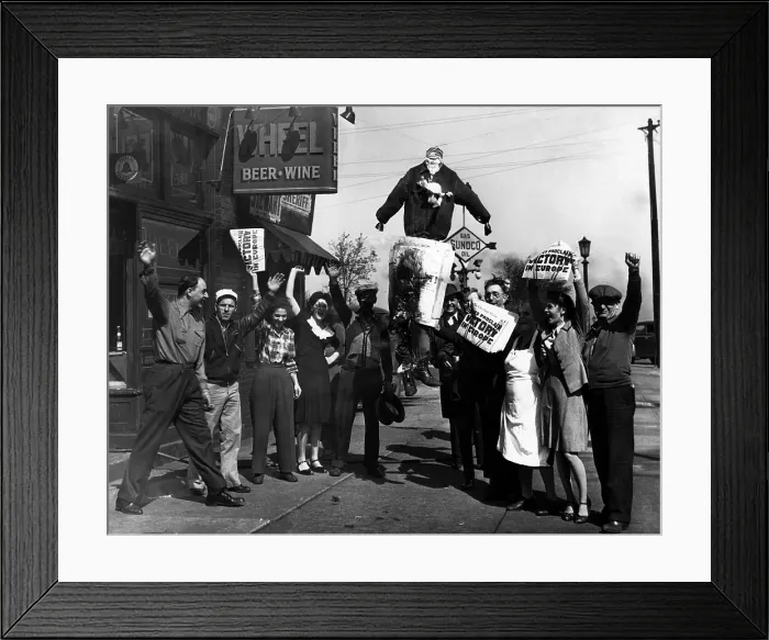 Framed Print : A crowd in Ohio celebrating VE Day and the end of World War II in Europe by burning an effigy of Adolf Hitler