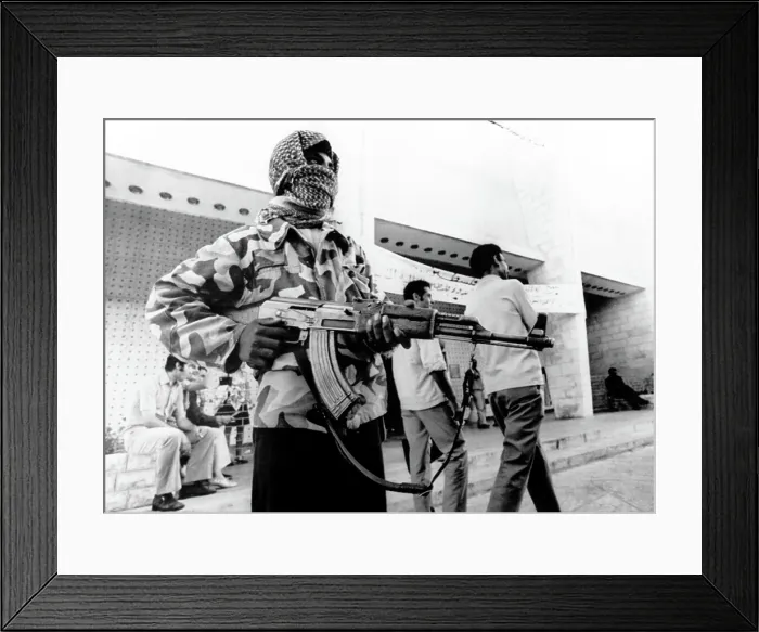 Framed Print : Arab-Israeli War, female guerrilla guarding the Congress Building during the 2nd World Conference of the General Union of Palestine Students, Amman, Jordan, September 11, 1970