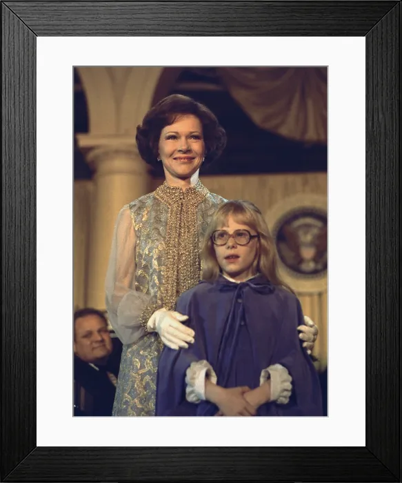 Framed Print : First Lady Rosalynn Carter and 10 year old daughter Amy attend an inaugural ball on January 20, 1977