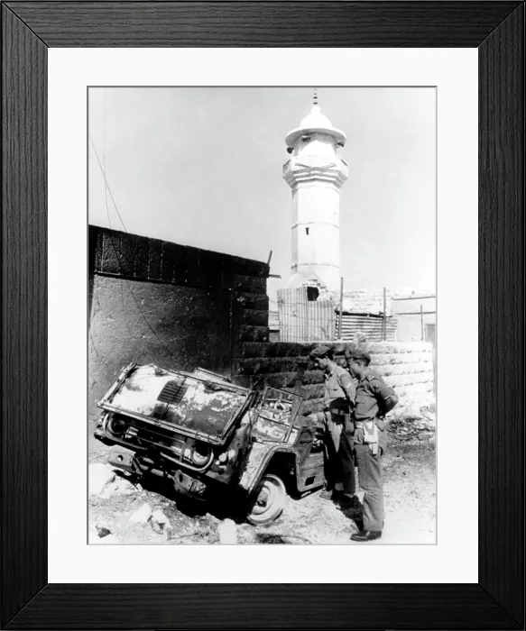 Framed Print : Arab-Israeli War, Royalist soldiers inspecting the burned hulk of a Commando vehichle outside guerrilla headquarters, Amman, Jordan, 09 / 26 / 70 Framed Print : Arab-Israeli War, Royalist soldiers inspecting the burned hulk of a Commando vehichle outside guerrilla headquarters, Amman, Jordan, 09 / 26 / 70
