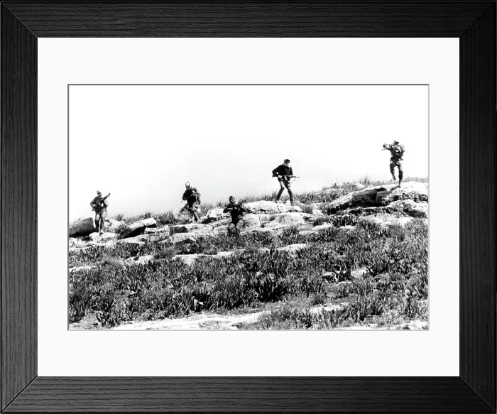 Framed Print : Arab-Israeli War, Commando trainees advancing in a skirmish line during training at a guerrilla camp in the Jordanian Desert, March 14, 1970