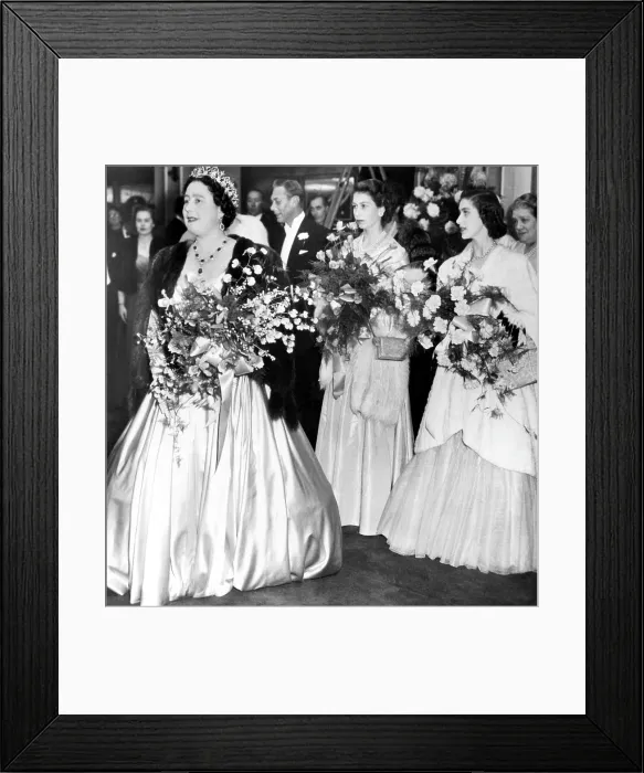 Framed Print : Queen Elizabeth, King George VI (back), Princess Elizabeth (the future Queen Elizabeth II), Princess Margaret Rose, at the Odeon Theater to see THE FORSYTHE SAGA, November 19