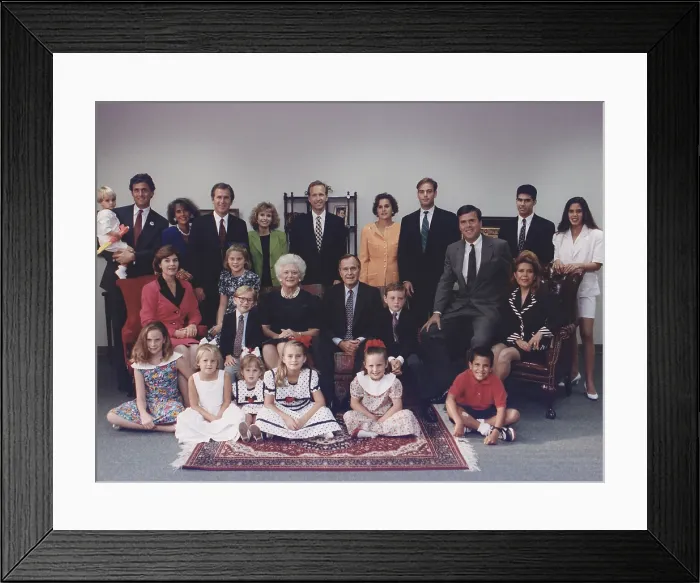 Framed Print : President George H. W. Bush and wife Barbara pose with their six children, their spouses and twelve grandchildren for a family portrait in Houston, Texas. Ca. 1991 Framed Print : President George H. W. Bush and wife Barbara pose with their six children, their spouses and twelve grandchildren for a family portrait in Houston, Texas. Ca. 1991