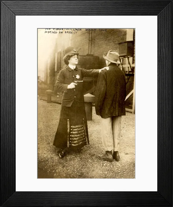 Framed Print : A woman behaving as a policeman, original title: How woman policeman would look making an arrest, September, 1909