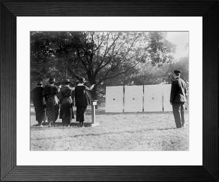 Framed Print : Target shooting, four women shooting at targets as a policeman watches, circa 1909-1932 Framed Print : Target shooting, four women shooting at targets as a policeman watches, circa 1909-1932