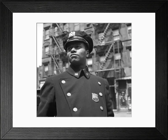 Framed Print : Portrait of an African American policeman, original title: New York, New York. Policeman no. 19687, photograph by Gordon Parks, May, 1943