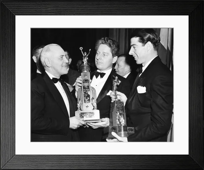 Framed Print : Billiards Champion, Willie Hoppe, receives a trophy as the Most Courageous Athlete of 1941. With pneumonia