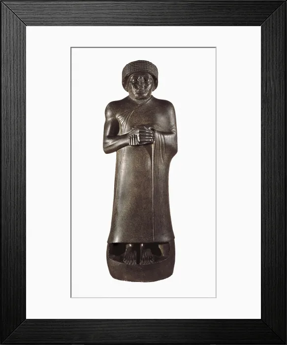 Framed Print : Statue of a King with clasped hands, possibly Gudea, Prince of Lagash. 2130 BC. Mesopotamian art. Sculpture on rock. FRANCE. Paris. Louvre Museum. Proc: IRAQ. Tello. Girsu