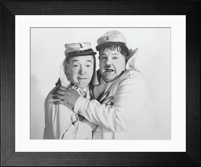 Framed Print : THE FLYING DEUCES, from left: Stan Laurel, Oliver Hardy, 1939 Framed Print : THE FLYING DEUCES, from left: Stan Laurel, Oliver Hardy, 1939