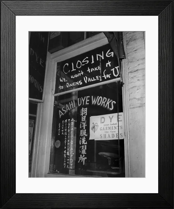 Framed Print : World War II, Shop window of Asahi Dye Works with sign reading: Closing, we won't take it to Owens Valley for U