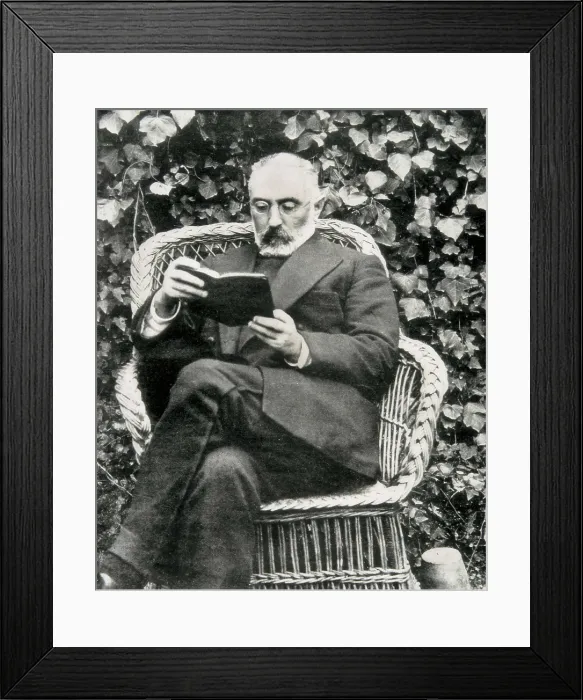 Framed Print : UNAMUNO, Miguel de (1864-1936). Miguel de Unamuno reading in a garden. Photography taken after his return from exile