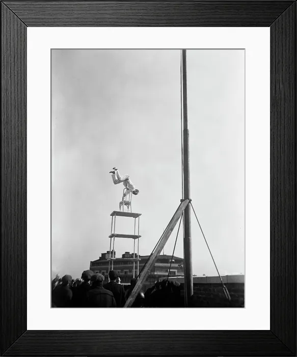 Framed Print : Jammie Reynolds, balancing on the on chairs on the edge of a rooftop in Washington, DC ca. 1921