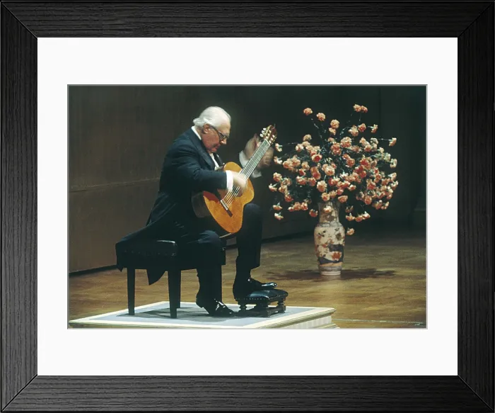 Framed Print : SEGOVIA, Andrs (1894-1987). Portrait during a performance. AISA / Everett Collection**US SALES ONLY**